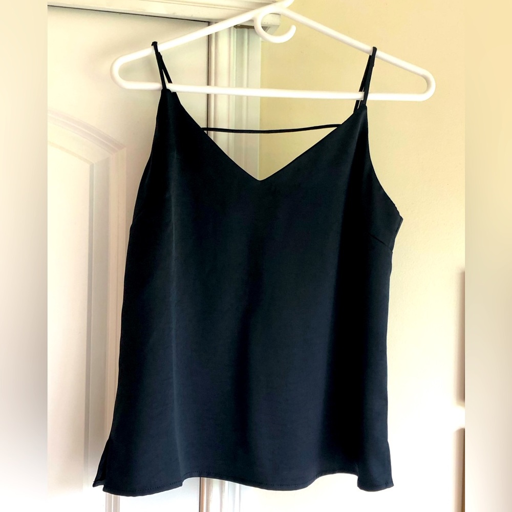 Silky navy tank top with string back. Skies are Blue brand. Size small